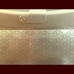 Wendy Stevens metal clutch w leather strap